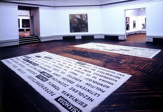 Willem Boshoff Writing in the Sand (2001) Ten 40kg bags of black and white sand, stencils, sieve, and buckets used for a floor installation. Den Frie Udstillings, Copenhagen (2001)